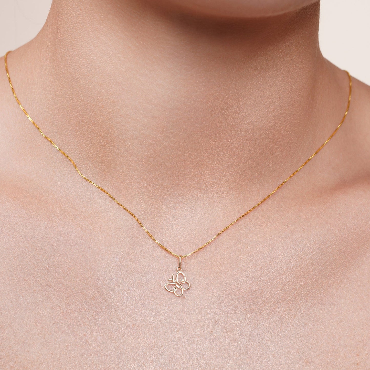 14KP0001. - 14 Karat Yellow Gold 9.7mm Butterfly Pendant