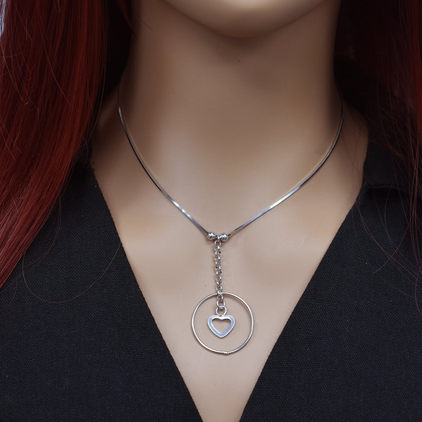 Rhodium Plated 925 Sterling Silver Cut Out Dangle Heart Necklace - SPN00028