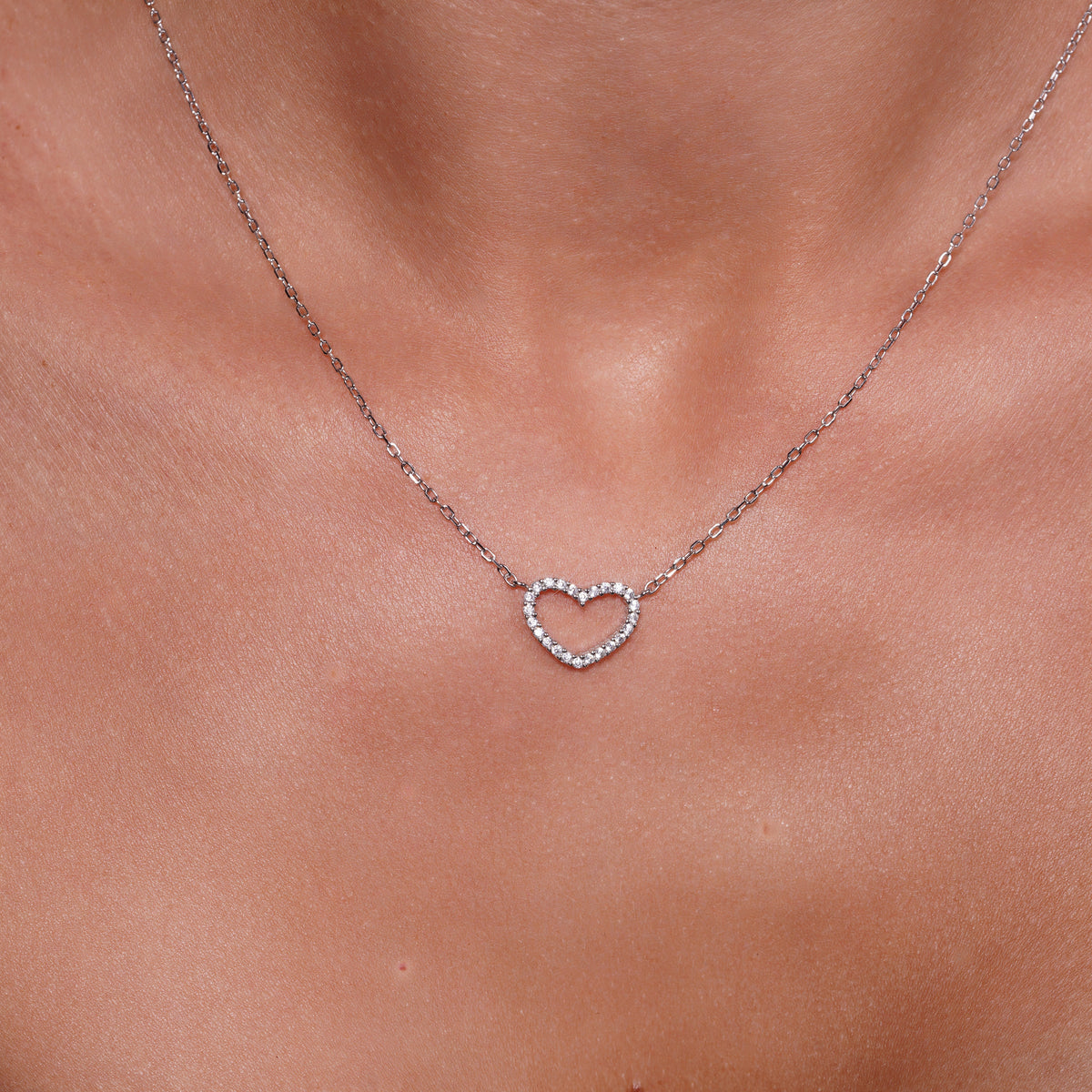 Rhodium Plated 925 Sterling Silver CZ Heart Outline Pendant - SPP00080