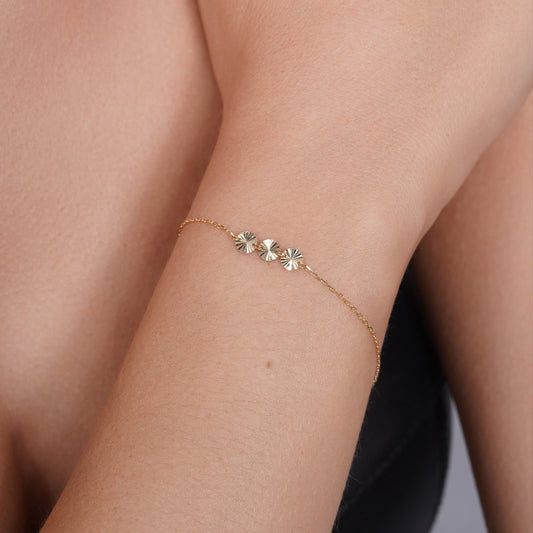 14KB0016. - 14 Karat Yellow Gold Three Diamond Cut Round Charm Adjustable Bracelet