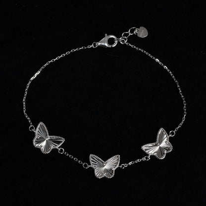 Rhodium Plated 925 Sterling Silver Diamond Cut Three Butterfly Charm 12mm x 9.5mm Adjustable Bracelet  - PXB00001